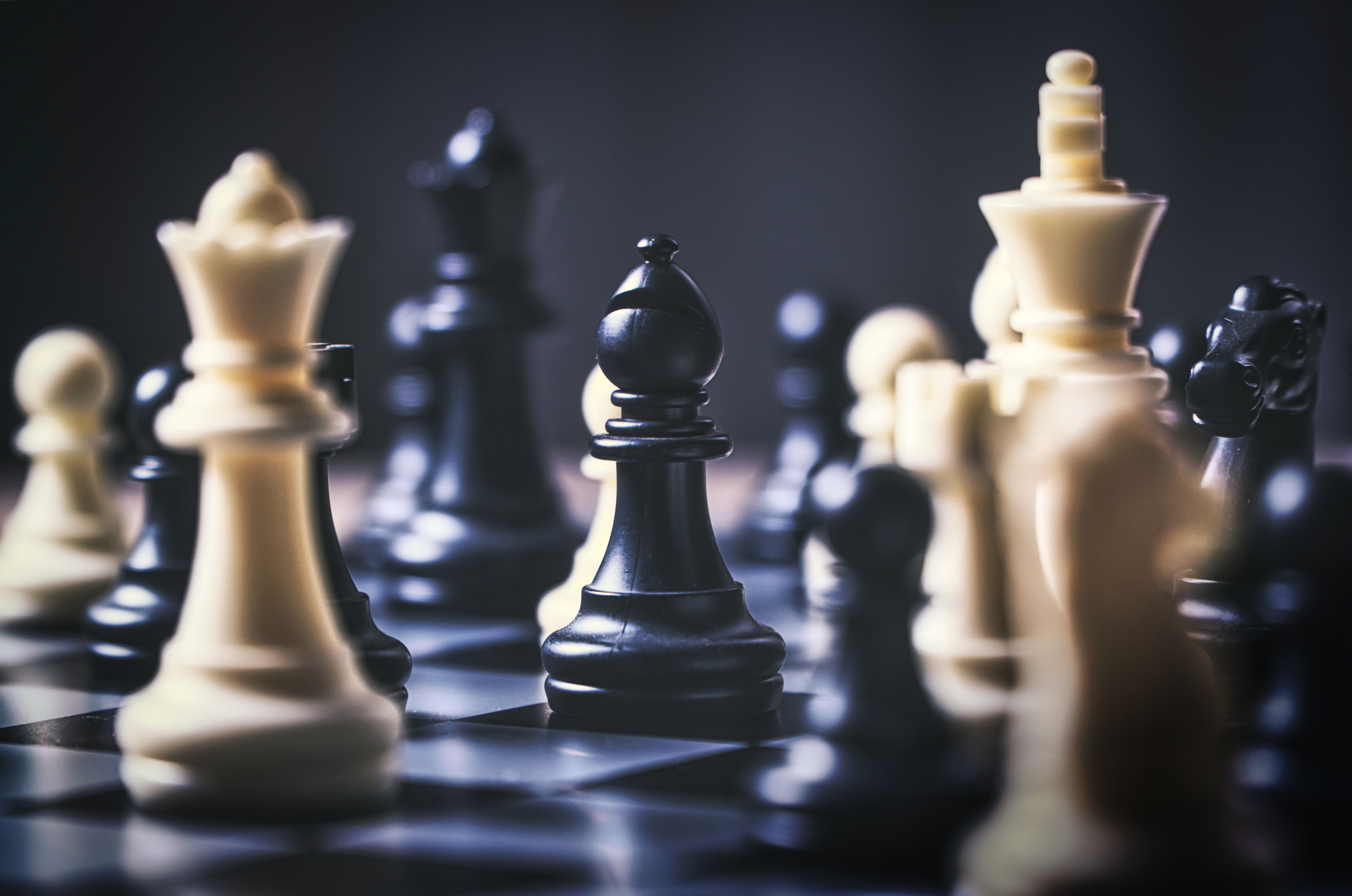 a chess board with white and black pieces